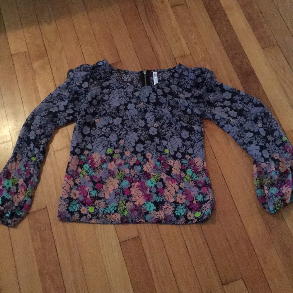 Sheer floral blouse.